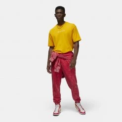 Jordan Essential Ανδρικό Παντελόνι Φόρμας FIRE RED -Lifestyle Ρούχα Εκπτώσεις jordan m j ess stmt wash flc pant 12